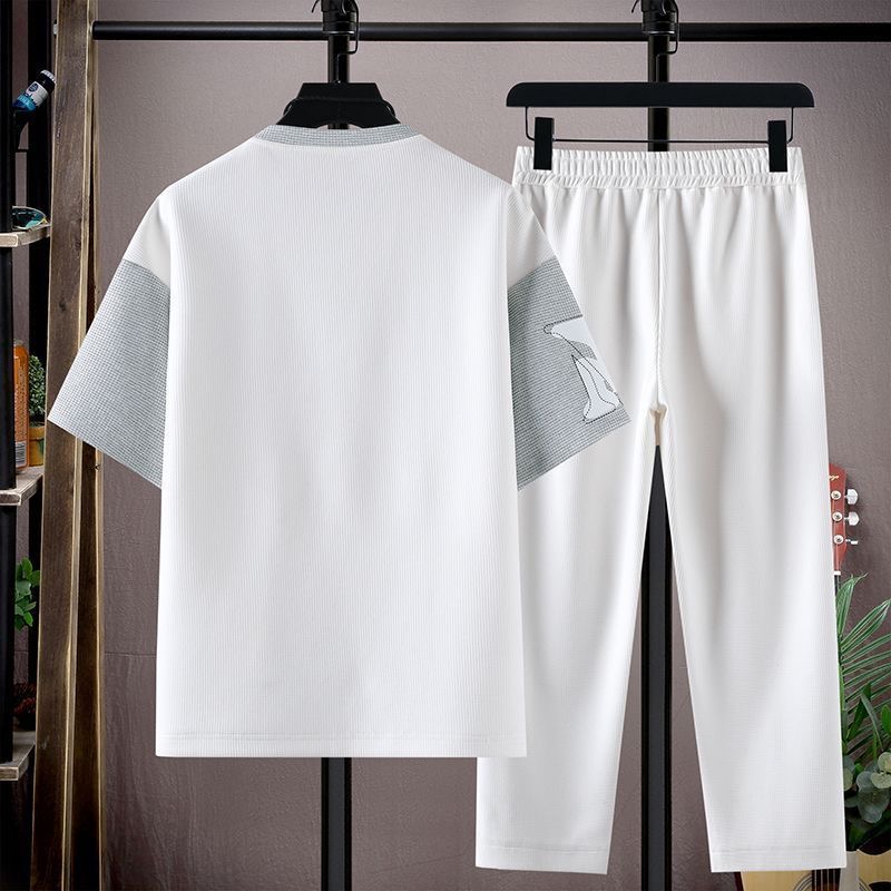 夏のファッショントレンディなプリント半袖 Tシャツスポーツセ - Embellish Knit のレビューと価格