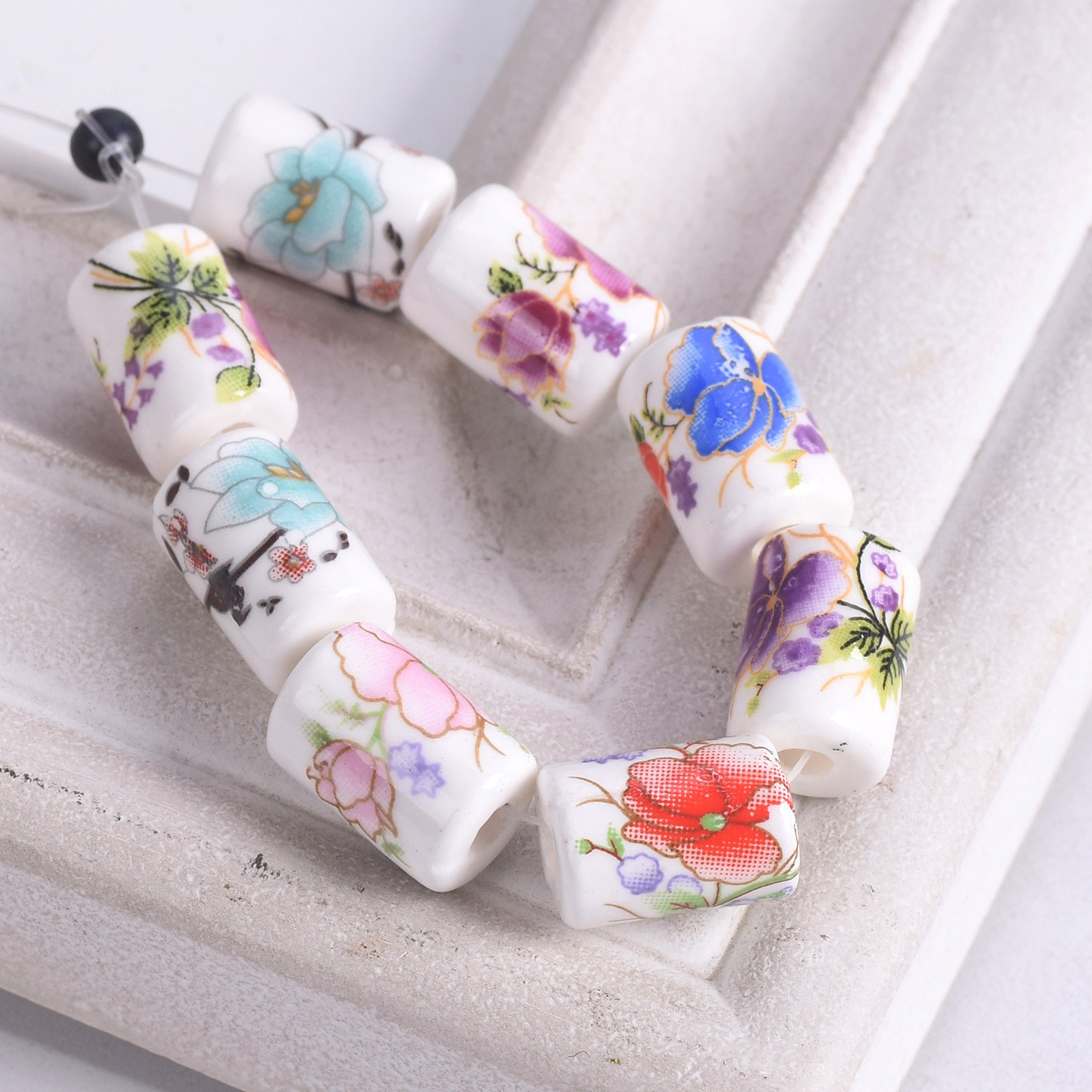 10 個 12 × 9 ミリメートル円筒形花柄セラミック磁器 - Embellishment Crafts のレビューと価格