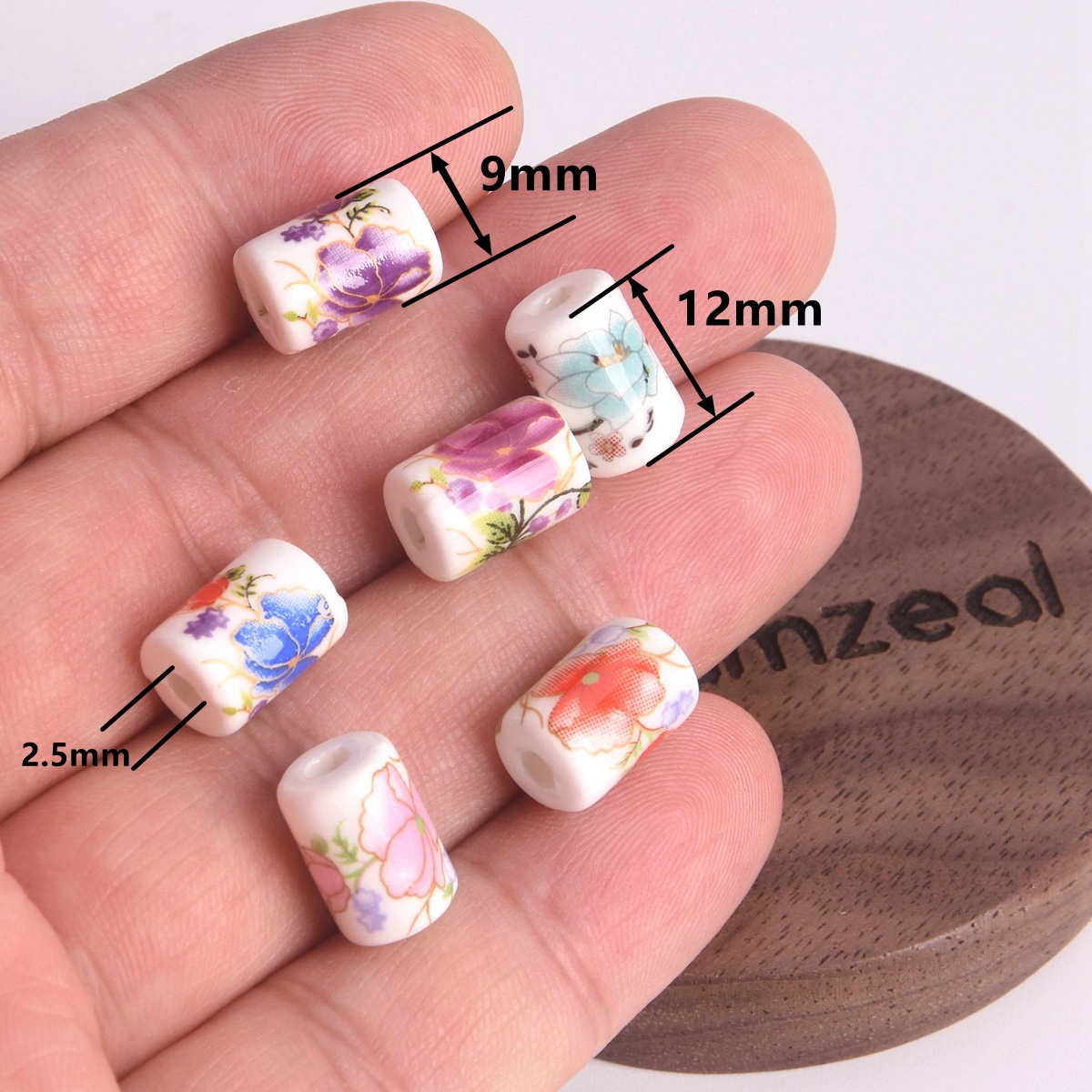 10 個 12 × 9 ミリメートル円筒形花柄セラミック磁器 - Embellishment Crafts のレビューと価格