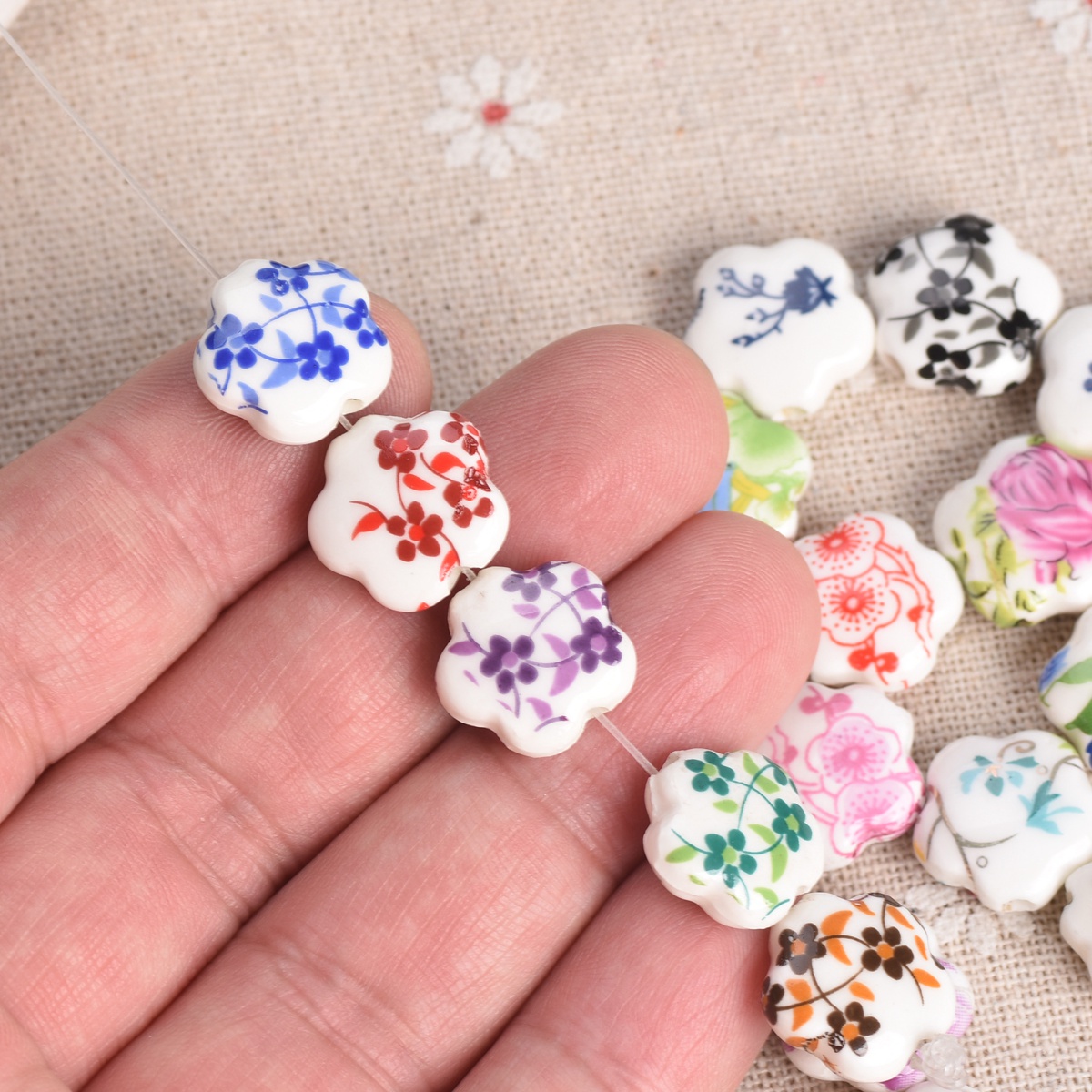 10 個 15 ミリメートル花の形パターンセラミック磁器ルー - Embellishment Crafts のレビューと価格