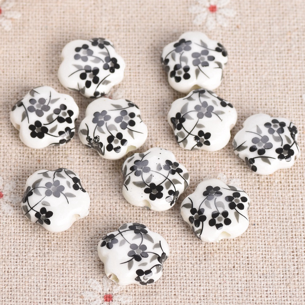 10 個 15 ミリメートル花の形パターンセラミック磁器ルー - Embellishment Crafts のレビューと価格
